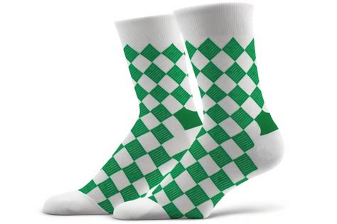 Premium AI Image | White socks with green geometric pattern isolated on ...