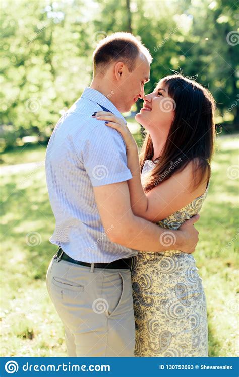 Young Loving Couple Walking In The Park Outdoors Stock Image Image Of