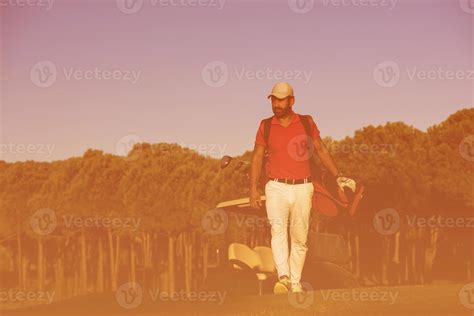 Golfer Walking And Carrying Golf Bag 10872082 Stock Photo At Vecteezy