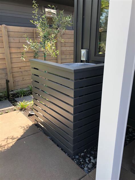 Hide Your Trash Cans with Outdoor Planters