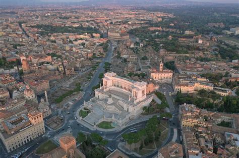 Aerial View Of Altare Della Patria With Colosseum In Rome Italy Stock