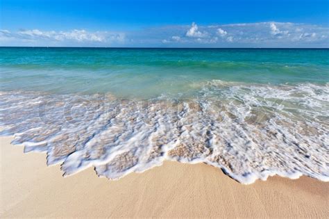 Beautiful beach and waves of Caribbean ... | Stock image | Colourbox