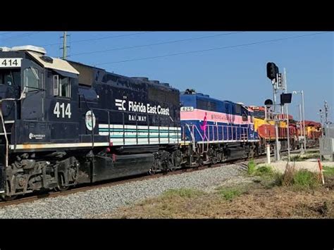 Florida East Coast Railway Train With A Pink Lady And Some