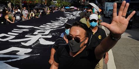 Hong Kong Protesters Defy Mask Ban In New Round Of Demonstrations As