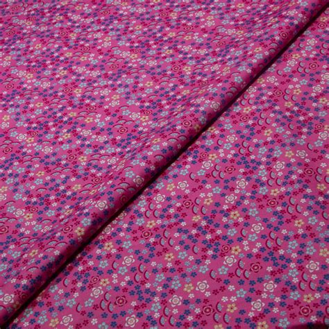 Popeline 100 coton Lucie fond fuchsia vendu au mètre