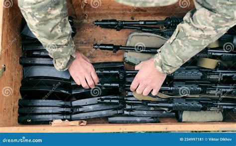 The Military Puts Ammunition In A Box Sorting Ammunition And