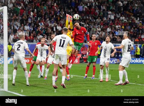 Portugal S Cristiano Ronaldo Attempts A Header On Goal Under Pressure