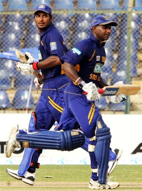 Chaminda Vaas Celebrates With A Team Mate After Getting The First