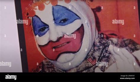 THE JOHN WAYNE GACY MURDERS: LIFE AND DEATH IN CHICAGO, framed photo of John Wayne Gacy in clown ...