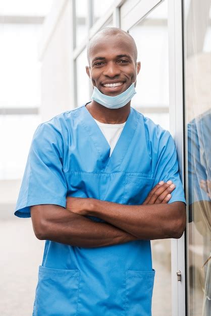 Premium Photo Young And Successful Surgeon Confident Young African