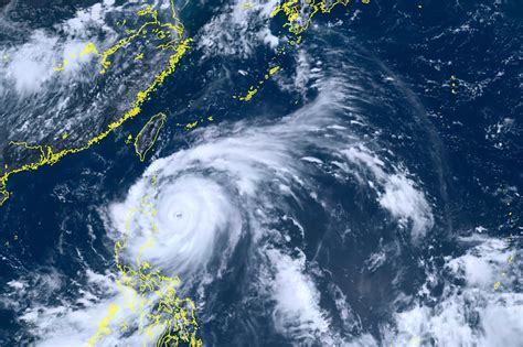 Strong typhoon blows closer to northern Philippines,…