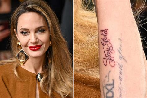 Angelina Jolie Debuts New Stay Gold Tattoo At The Outsiders Opening