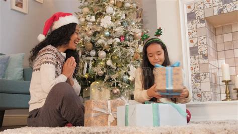 Black Mom Surprises Daughter With Christmas Present Stock Video Video