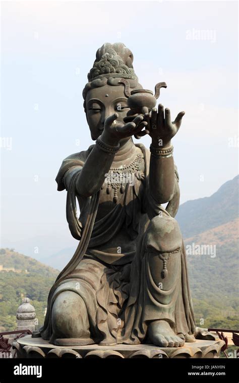 Buddhistic Statue Making Offerings To The Tian Tan Buddha In Hong Kong