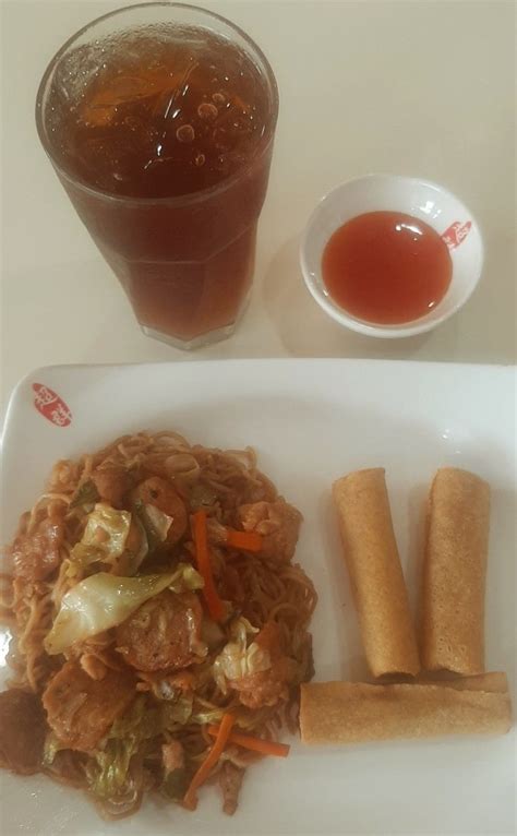 Chowkings Pancit Canton And Lumpiang Shanghai Served With Iced Tea