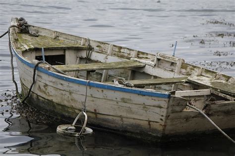 Premium Photo Boat Moored In Lake