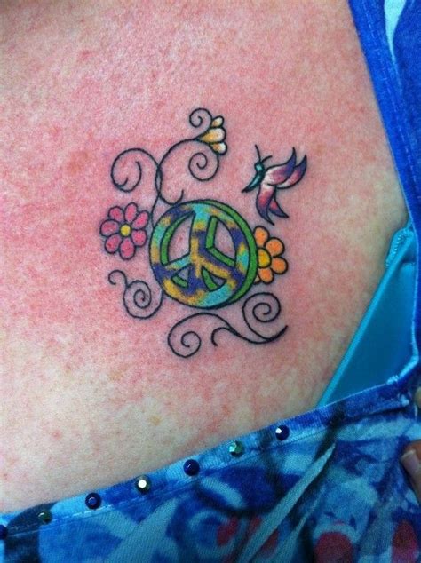 15 Wonderful Floral Peace Sign Tattoo Inpirations This Pin Was Added