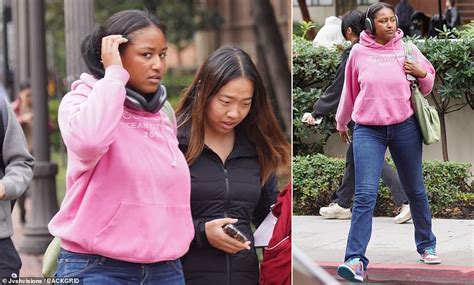 Sasha Obama braves the LA rain as she heads to class in a pink hoodie ...