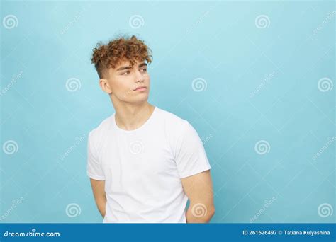 Horizontal Portrait Of A Handsome Man With Curly Hair Smiling