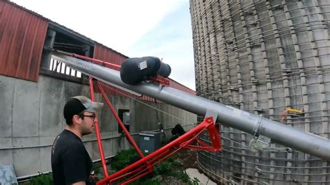 Opening Up Hi Moisture Corn Silo Using New Auger YouTube