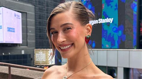 Hailey Bieber Shows Off Her Bare Stomach Under A Baggy Hoodie In A New Photo As Fans Believe She