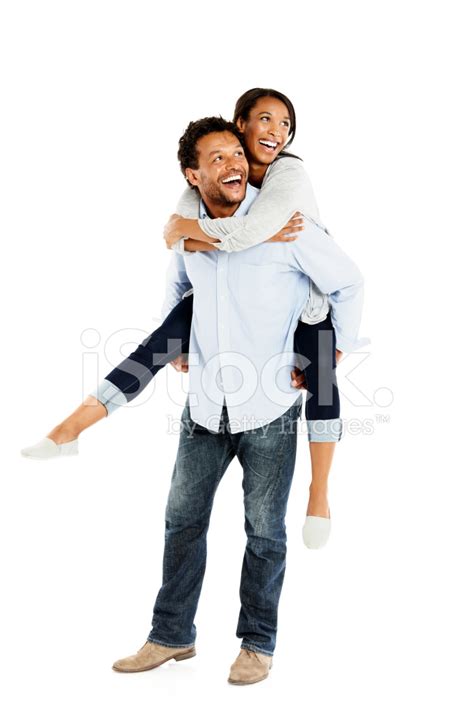 Mature Man Carrying His Girlfriend Looking Away Smiling Stock Photo Royalty Free Images