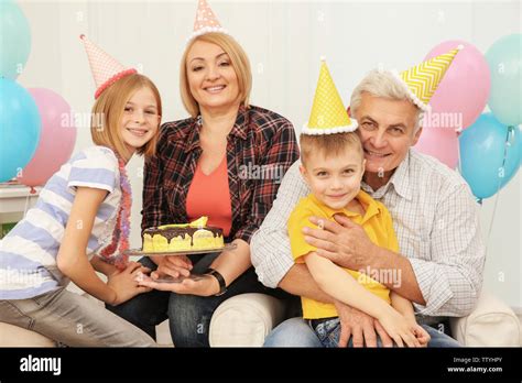 Grandparents And Children Celebrating Birthday Stock Photo Alamy