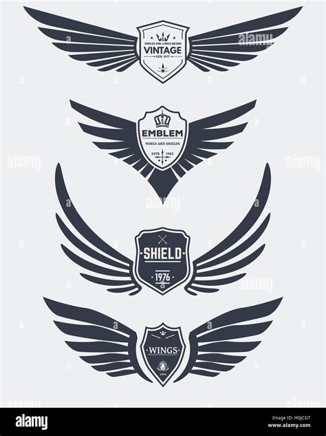 Set Of Inked Modern Wings And Shields Icons And Emblems For Logos Stock