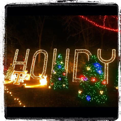 Holiday Lights In The Shape Of Trees And Letters That Spell Out