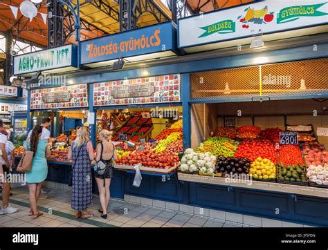 Colourful Fruit And Vegetable Stalls With Attractive Displays In The