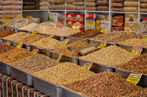 Premium Photo A Display Of Nuts And Dried Fruits At A Market