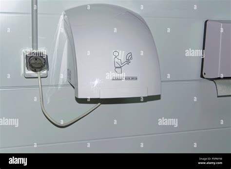Modern Vertical Hand Dryer In Public Restroom Wc Stock Photo Alamy