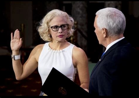 Kyrsten Sinema First Openly Bisexual U S Senator Sworn In On Law Book Go Magazine