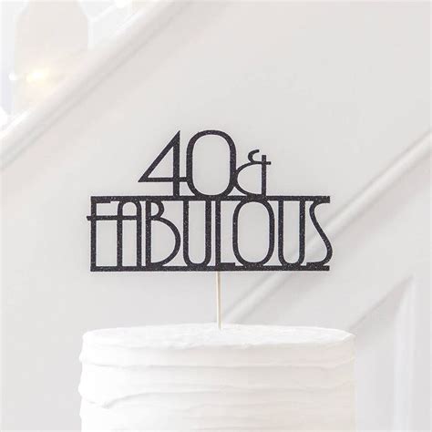 A Cake Topper That Says Forty And Fabulous