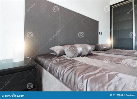 Modern Bed and Lamp Shades. Stock Photo - Image of bedding, elegance ...