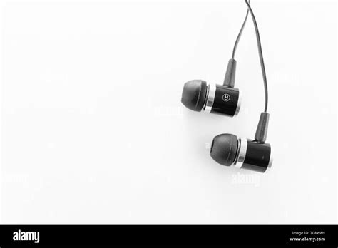 Black Wired Earbuds Stock Photo Alamy