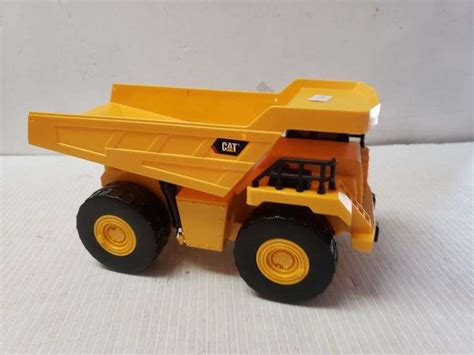 Caterpillar Toy Dump Truck - Trice Auctions