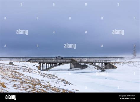 Bridge Over Frozen Water On Iceland Stock Photo Alamy