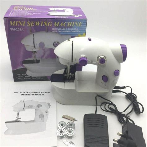 จกรเยบผาขนาดเลก พกพาสะดวก รน SM 202A Mini Sewing Machine สมวง