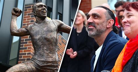 Statue of Sydney great Adam Goodes' famous 'war dance' unveiled at Swans HQ