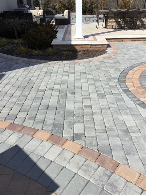 Roma 1 And 2 Paver Shown In Granite City Blend With Golden Brown Inlay