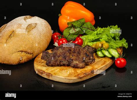 Roasted Hot Pork Liver Steak Isolated Stock Photo Alamy
