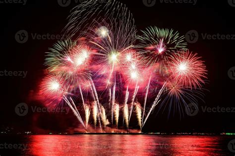 Amazing Beautiful Colorful Fireworks Display On Celebration Night Showing On The Sea Beach With