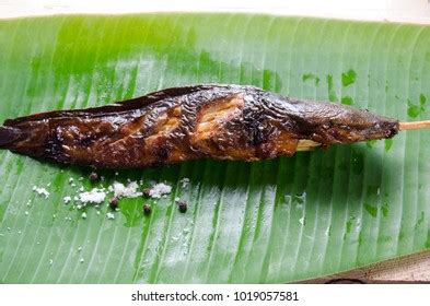 Fried Fish On Banana Leaf Backgroundthai Stock Photo 2232764297