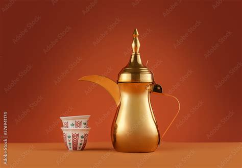 Arabian Coffee With Golden Dallah On A Dark Red Background A Still