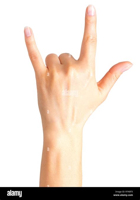 Female Hand Showing Rock N Roll Sign Or Giving The Devil Horns Gesture