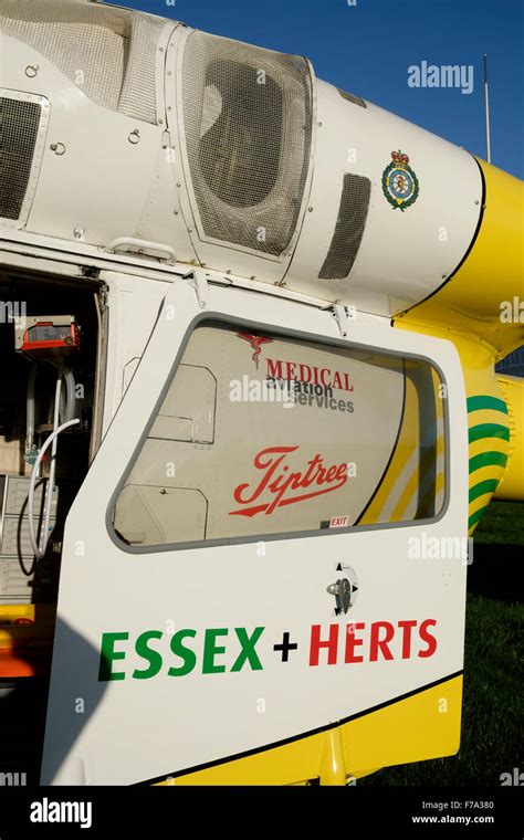 Essex And Herts Air Ambulance Trust Helicopter At Bathhouse Meadow Walton On The Naze Stock