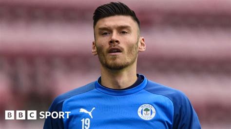 Kieffer Moore Wigan Athletic Reject Cardiff City Bid For Wales Striker