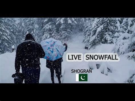 Tourists enjoying live snowfall in Shogran : firstsnow