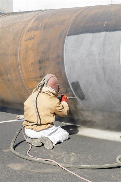 Sandblasting Or Abrasive Blasting To Steel Material Abrasive Blasting